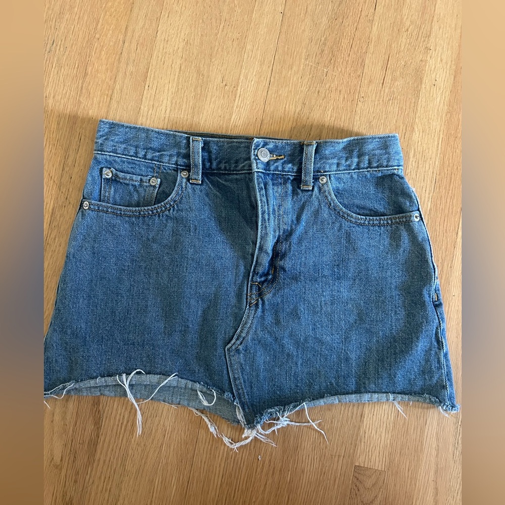 TNA aritzia denim mini cutoff skirt size 6